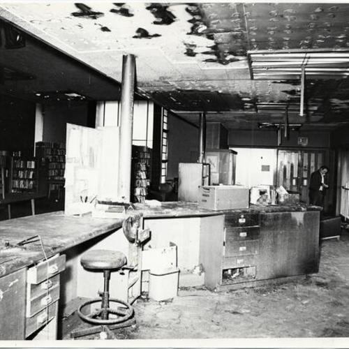 [Interior of Ortega Branch Library, showing fire and vandalism damage]