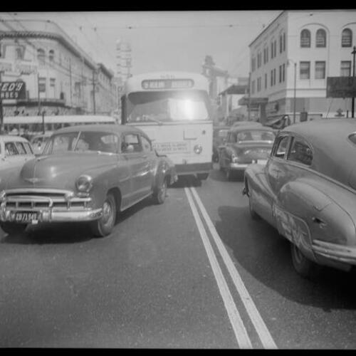 [Collision of Muni bus and automobile, looking north on Mission Street at 22nd Street]