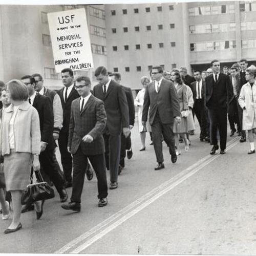 [Students from the University of San Francisco marching to St. Dominic's Church to attend services for bomb victims in Birmingham, Alabama]