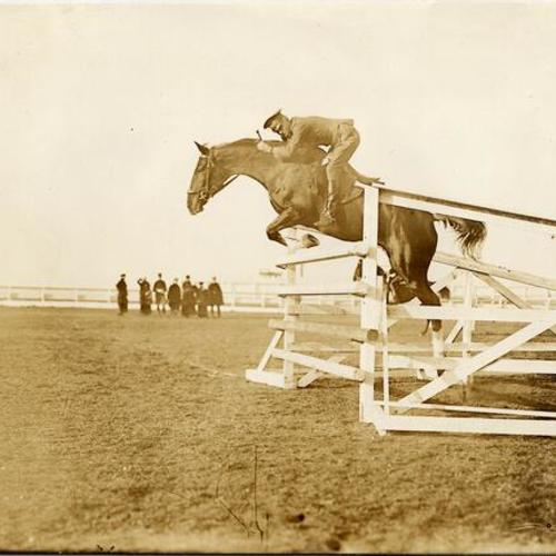 [Captain Fitzhugh Lee of the 3rd Artillery riding "Frederick the Great" in the Army Horse Show at the Panama-Pacific International Exposition]
