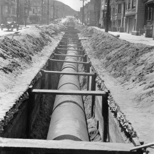 [Trench along Sixth Avenue and Hugo Street, looking south]