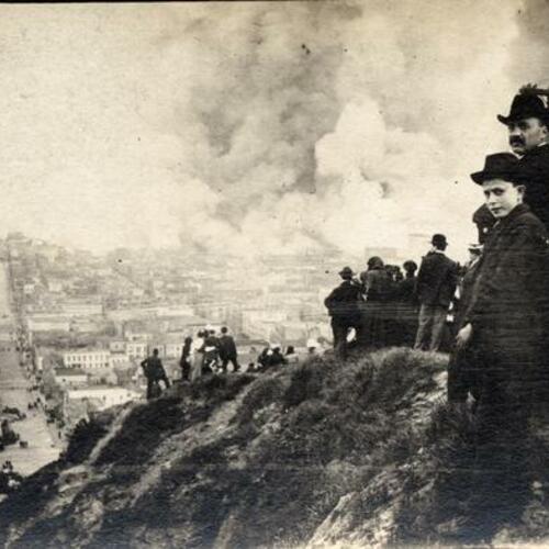 [Domenico and son watching with others as San Francisco burns, 1906]