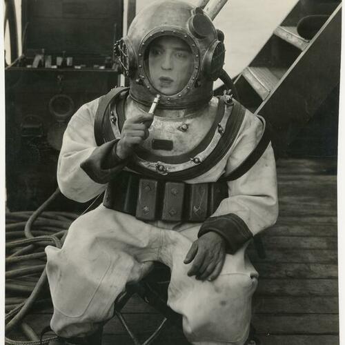 Buster Keaton wearing scuba suit in scene from silent film "The Navigator"