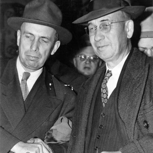 [James V. Bennett, director of the Federal Bureau of Prisons, and C. J. Shuttleworth, former associate warden on Alcatraz]