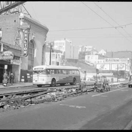 [Track removal near Castro and 17th street showing Twin Coach on 8 line]