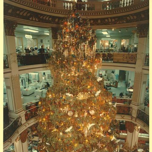 [Christmas tree inside City of Paris department store]