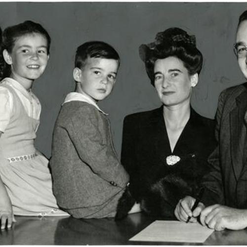 [Edmund G. Brown posing with his family as he files his declaration of candidancy for district attorney]