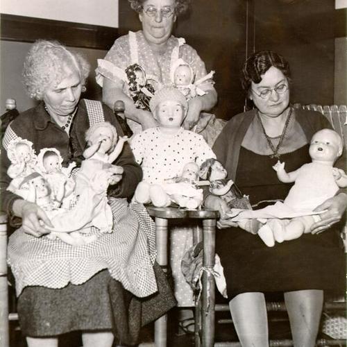 [Group of women holding dolls at Laguna Honda Home]