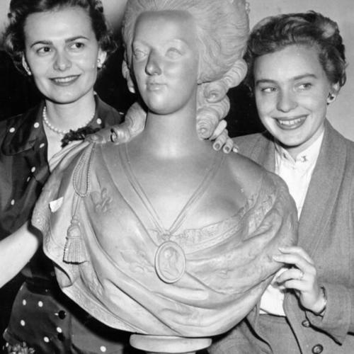 [Joan Quigley and Mrs. Peter Morrison with a life-size bust of Marie Antoinette prior to a benefit "treasure hunt" sale at the De Young Museum in Golden Gate Park]