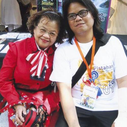 [Gene with his mother at Pistahan festival – annual party in celebration of Filipino art and culture at the YBCA]