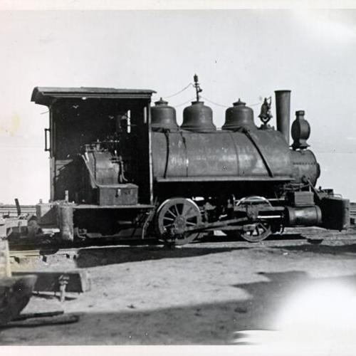 [Early train engine]