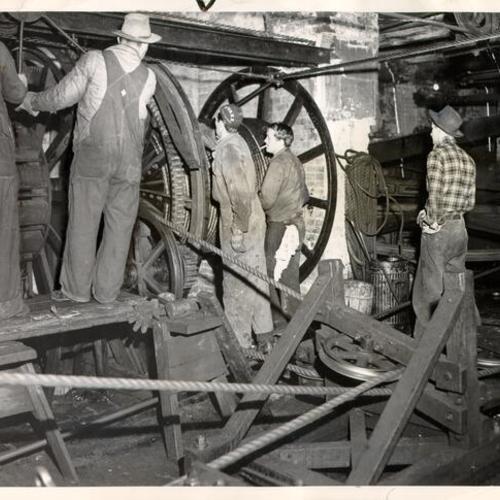 [Crew of workers at a cable car barn]