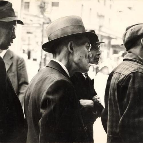 [Group of men in Chinatown]