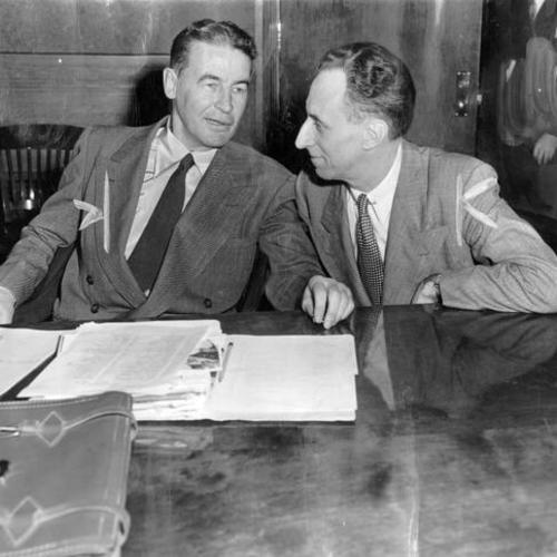 [Harry Bridges with attorney Vincent Hallinan (left) in court during session]
