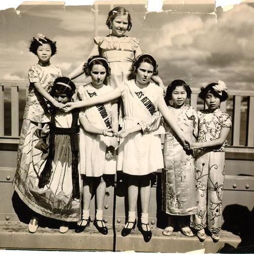 [Group of girls at a ceremony marking the driving of the last rivet during construction of the Golden Gate Bridge]