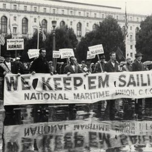 [Members of the National Maritime Union marching in Civic Center Plaza]