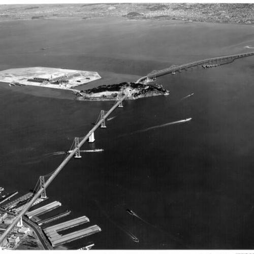 [Aerial view of suspension and cantilever sections of Bay Bridge with Yerba Buena Island and Treasure Island in center of photo]