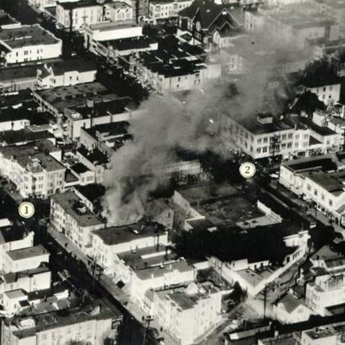 [Aerial view of a fire in the Mission district on 24th street]