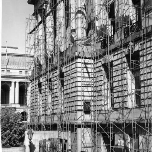 [South side of City Hall, seen here with scaffolding, to be cleaned for the first time since it was erected in 1912]