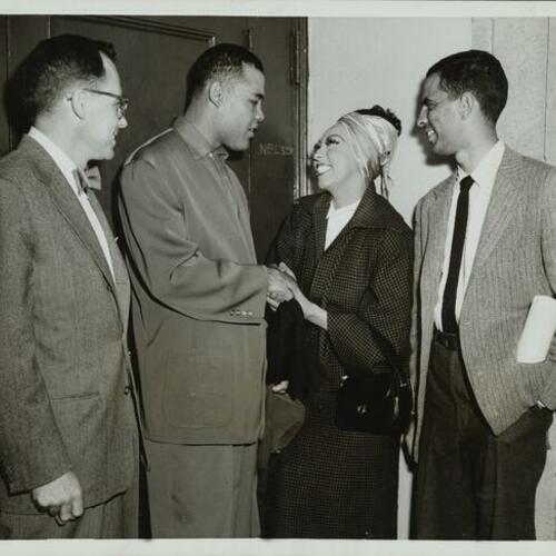 Executive Director of San Francisco Council for Civic Unity, Edward Howden with Joe Louis, Josephine Baker, and Franklin H. Williams, Regional Director of NAACP (left to right)