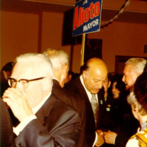 [Joe Alioto mingles with supporters during cocktail party]