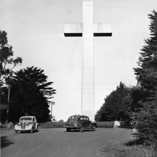 [Police car in front of cross at Mount Davidson]
