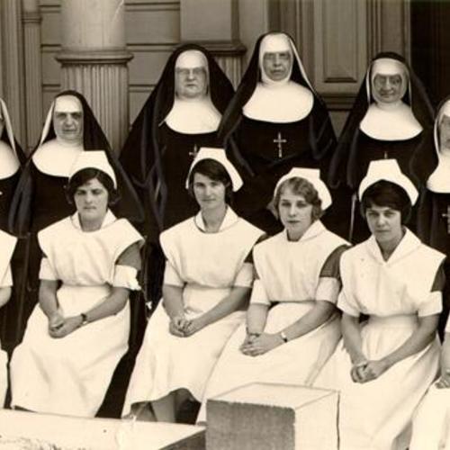 [Group of nuns and nurses at St. Joseph's Hospital]