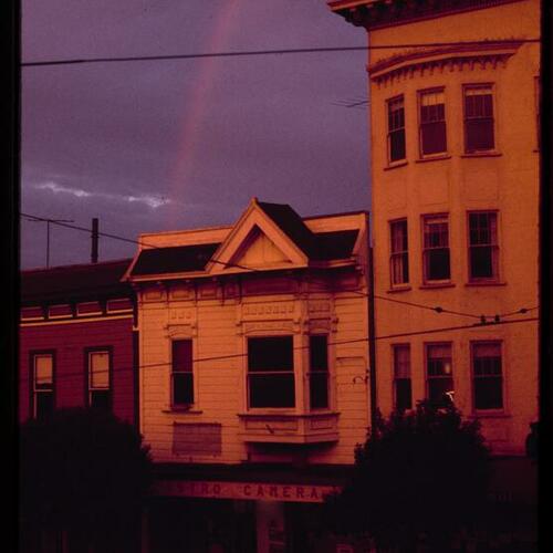 Harvey Milk's Castro Camera store at 573-575 Castro Street with rainbow in background