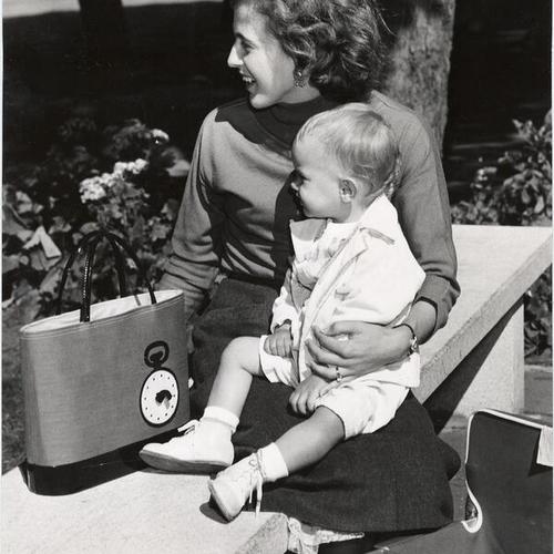 [Mrs. Charles Ray and her daughter Karen waiting for Charles Ray at San Francisco State College]