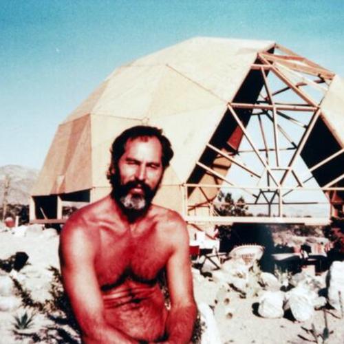 [Richard at Desert Hot Springs in front of geodesic dome he built himself]