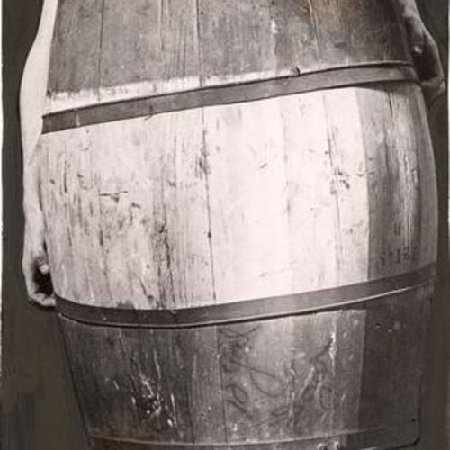 [Actor in a barrel during his performance in the play "Power"]