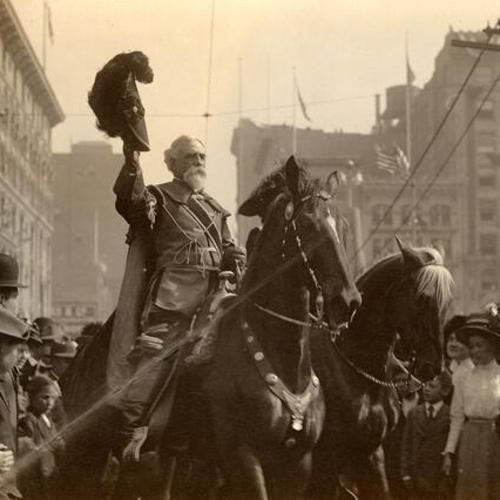 [Don Gaspar de Portola on horseback saluting school children at Union Square, Parade from Portola Festival, October 19-23, 1909]