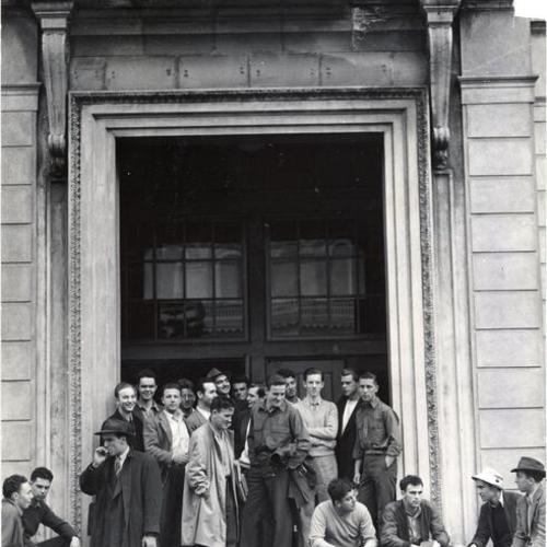 [Students hanging out at the entrance to the Liberal Arts Building on the University of San Francisco campus]
