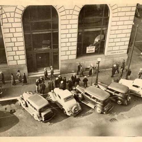 [Pickets at Standard Oil Co. building]