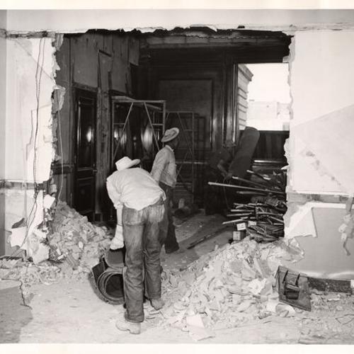 [Workmen wrecking rooms as part of the modernization being done at Seventh and Mission Post Office]