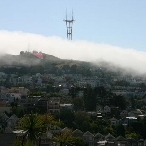 [Pink triangle on Twin Peaks with fog as seen from Rayburn Street on Gay Pride Day 2006]