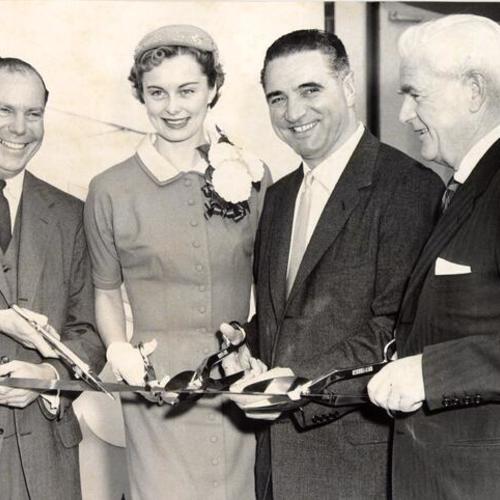 [R. C. Stolk, Jeanne Kessey, Mayor-Elect George Christopher and Thomas J. Mellon at the dedication ceremony for the American Can Company's expanded manufacturing plant]