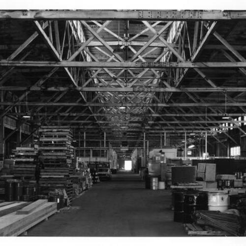 [Interior view looking towards the front of Pier 16 shed]