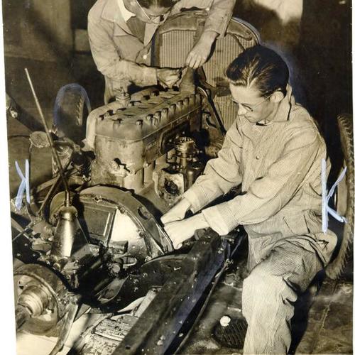 [Students working on automobile at George Washington High School]