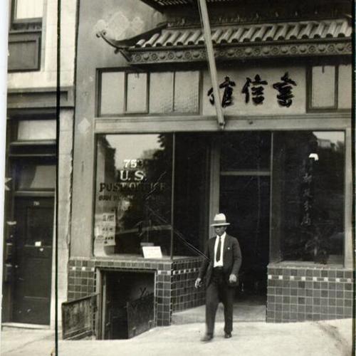 [Man exiting the Chinatown Post Office]