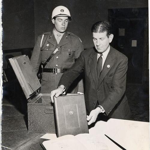 [John Sutro holding charter book during United Nations Conference, 1945]