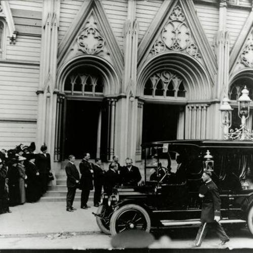 [Funeral for policeman Edward Maloney showing hearse in front of Saint James Church on Guerrero Street]