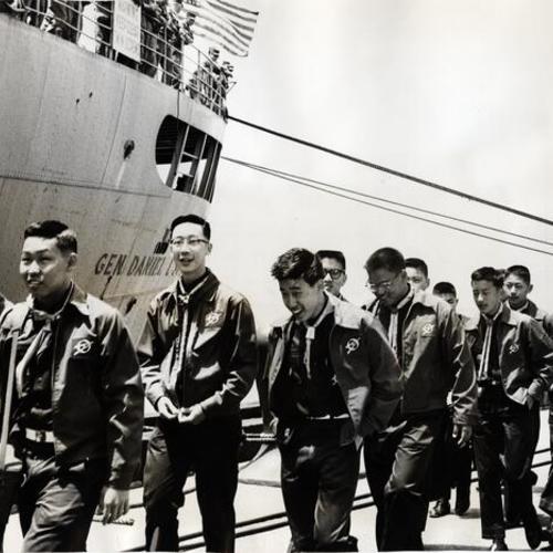 [32 Bay Area Boy Scouts and six leaders preparing to march aboard the Daniel I. Sultan on the way to Hawaii and Japan]