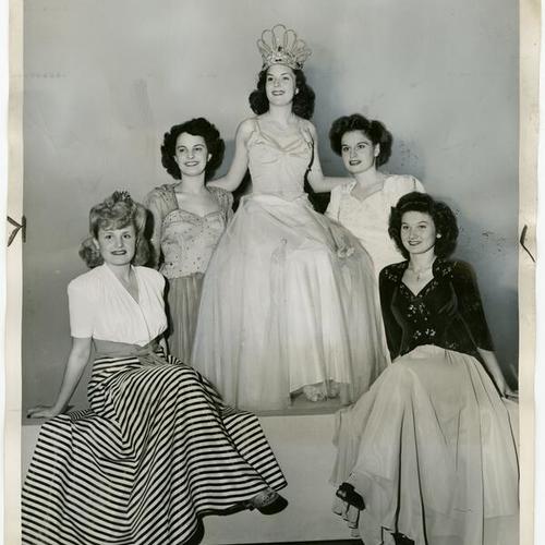 [Linn Biron as Harbor Day Queen, here with her court in advance of the Military Spotlight Ball]