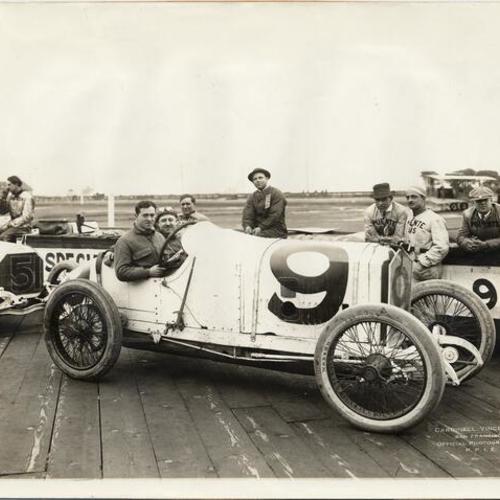 [Vanderbilt Cup winner Darius Resta posing in race car at the Panama-Pacific International Exposition]