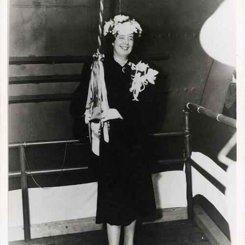 [Mrs. Thomas C. Kinkaid preparing to christen the USS Coral Sea (aircraft carrier; CVB-43)]