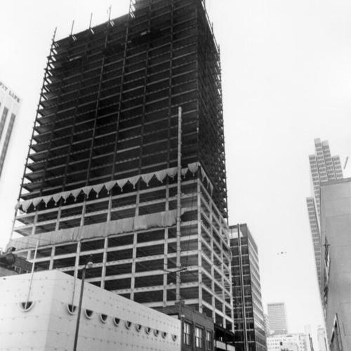[Downtown building under construction]