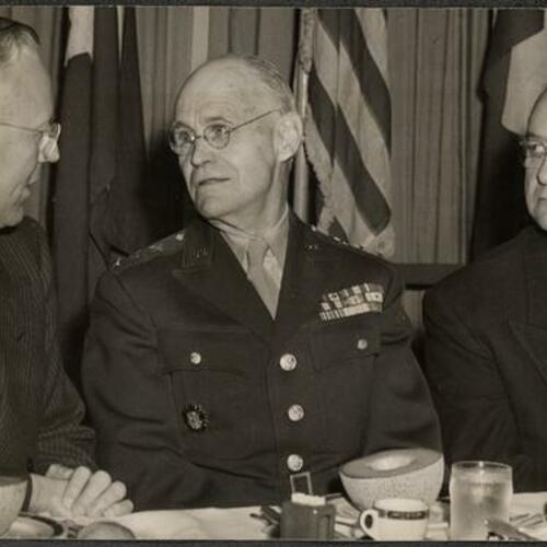 Governor Warren, Lieutenant General John L. Dewitt, and Ernest Ingold (left to right)