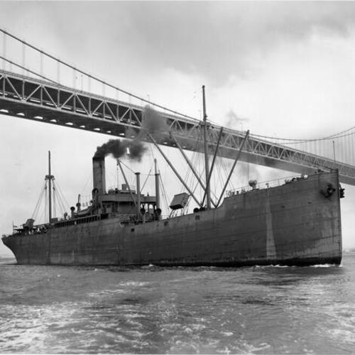 [Unidentified U.S. Navy ship sails past Bay Bridge prior to exiting bay]