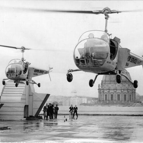 [Helicopters landing on the roof of the Western Merchandise Mart]
